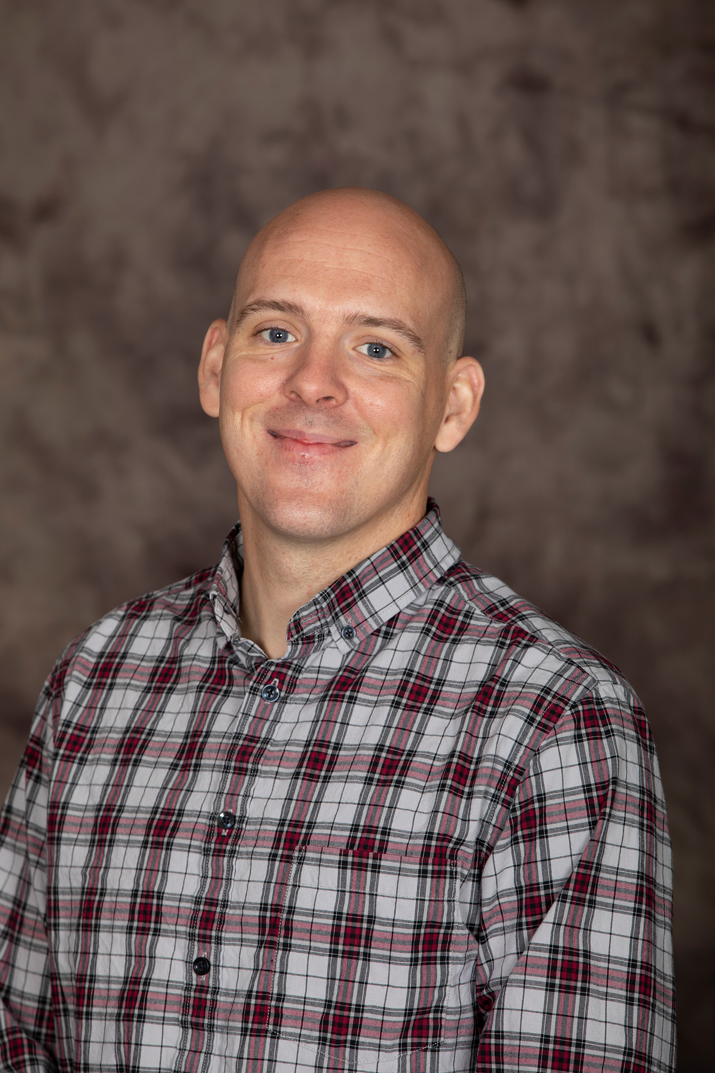 man in checkered shirt