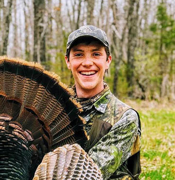 J.D. Kennedy tending to a turkey. 